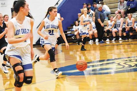 Justin Fitzgerald/sports@cherokeescout.com Hiwassee Dam’s Kiera Taylor pushes the ball up court during the Lady Eagles’ 41-33 loss to Towns County (Ga.) on Nov. 16.