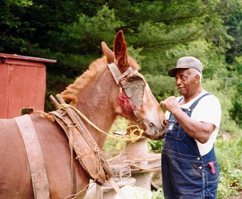 Purel Miller plowed the gardens of many folks in the Andrews Valley over the years with his mule, Pat. He also serenaded the neighborhood with his beautiful rich singing voice as he plowed.  