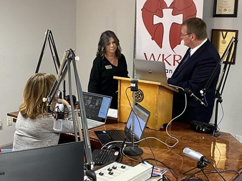 David Brown/dbrown@cherokeescout.com Cherokee County Chamber of Commerce Executive Director Sherry Raines (middle) confers with board member/emcee Tim Radford and vice president Kathryn Jenkins during the online annual membership meeting Thursday.