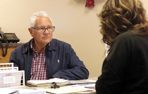 Jared Putnam/editor@cherokeescout.com Cherokee County Commissioner Cal Stiles speaks with Director of Elections Leighsha Jones on Monday at the Cherokee County Board of Elections.