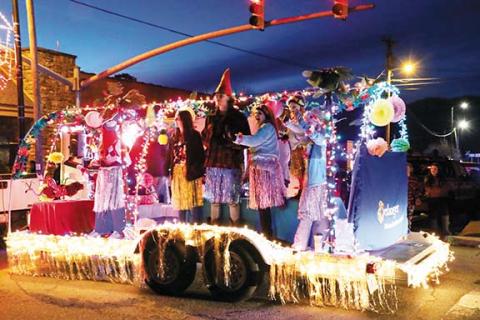 Photos by Debbie Hooper/Contributing Photographer The float from Erlanger Western Carolina Hospital was decorated with joyous colors and people Saturday night.