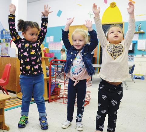 Abigail Hickman/Staff Correspondent Nyaa, Lakelynn and Anaiyah get active together at the Murphy Early Education Center.