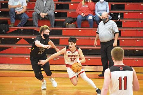 Cherokee Scout Andrews’ Donovan Bateman tries to take it to the hoop  during the Wildcats’ 56-51 win over Murphy on Jan. 5.