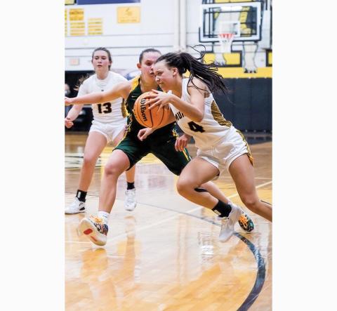 Sam Jokich/Staff Correspondent Murphy’s Calista Adams drives to the basket during the Lady Bulldogs’ 50-36 loss to A.C. Reynolds on Nov. 23.