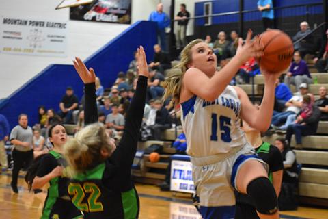 Justin Fitzgerald/sports@cherokeescout.com Hiwassee Dam freshman Olivia McNabb looks to finish a layup during the Lady Eagles’ 64-48 win over Blue Ridge on Friday night.