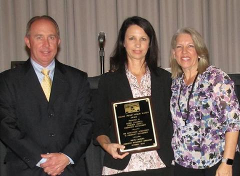 Robin Caldwell, emergency management director in Cherokee County, has been honored with the 2020 Colonel Phillip Nichlos Waters Award. With her is Brent Fisher, 2019-20 N.C. Emergency Management Association president; and Mary Beth Newns, the 2020-21 NCEMA president.