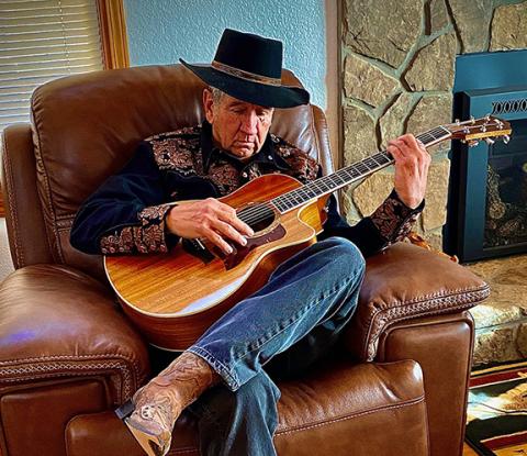 Eli Grimes in his natural state – picking his guitar.