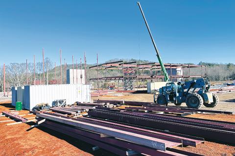Jared Putnam/editor@cherokeescout.com Construction crews work on Cherokee County’s new School of Innovation & Technology, which is off U.S. 64 East near Tri-County Community College in Peachtree, on Thursday.