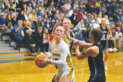Justin Fitzgerald/sports@cherokeescout.com Murphy junior Lochlan Rogers tries to score inside during the Lady Bulldogs’ 58-48 win over Fannin County, Ga., on Saturday.