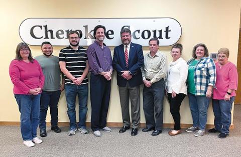Jared Putnam/editor@cherokeescout.com Staff members of the Cherokee Scout gather Friday with CNI Chairman Alan NeSmith. From left are Donna Getch, Matthew Crawford, Justin Fitzgerald, David Brown, NeSmith, Dave Stevens, Debbie Dills, Christy Guthrie and Charlene Kephart.