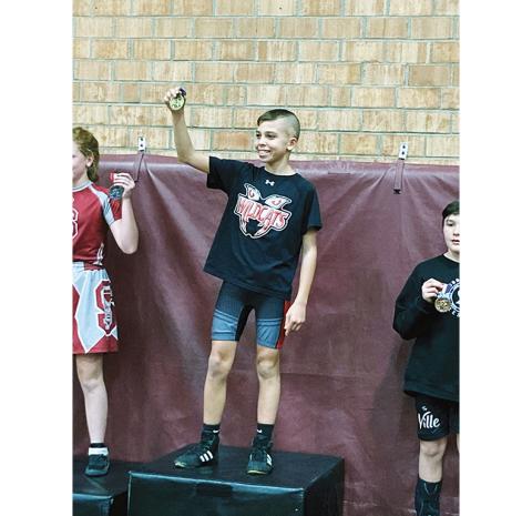 Justin Fitzgerald/sports@cherokeescout.com Chase Beasley of Andrews won the 90-pound weight class during the Smoky Mountain Conference Middle School Wrestling Championships on Dec. 15.