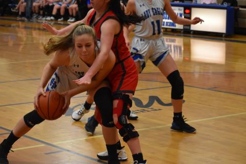 Justin Fitzgerald/sports@cherokeescout.com Lady Eagles freshman Olivia McNabb battles inside during Hiwassee Dam’s 40-36 win over Copper Basin, Tenn., on Saturday night.