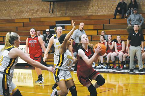 Justin Fitzgerald/sports@cherokeescout.com Andrews freshman Kylie Donaldson looks to finish during the Maroon Devils Christmas Classic on Dec. 29.