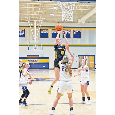 Dave Guffy/Contributing Photographer Murphy’s Torin Rogers rises for a floater during the Lady Bulldogs’ 63-58 win over Highlands on Jan. 12. Rogers scored a career-high 42 points, surpassing her previous career high of 37 against Highlands on Jan. 5.