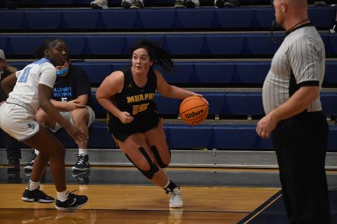 Justin Fitzgerald/sports@cherokeescout.com Murphy senior Amber Martin tries to get by her Enka’s Keisha Adjaidoo during the Lady Bulldogs’ 71-62 win over Enka on Jan. 14.