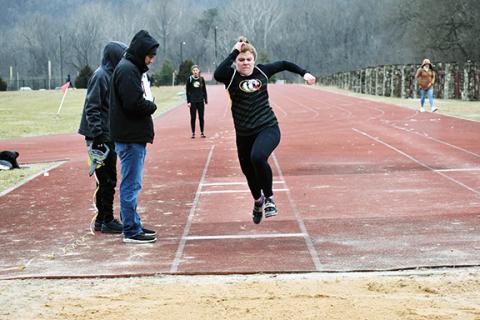 Justin Fitzgerald/sports@cherokeescout.com Murphy senior Faith Ann Revis takes off in the long jump at the inaugural Smoky Mountain Conference Indoor Track Championships on Feb. 2. Revis will compete in the long jump, triple jump and shot put at the 1A/2A state meet Friday in Winston-Salem.