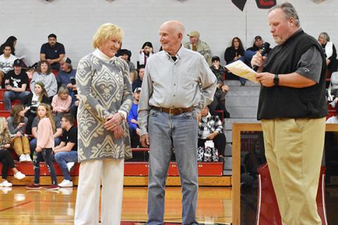 Justin Fitzgerald/sports@cherokeescout.com Cissy Bristol Dyer, former Andrews coach Ken Solesbee and Andrews High School Principal Lance Bristol (from left) at Dyer’s jersey retirement ceremony Friday.