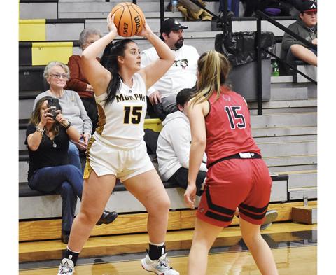 Justin Fitzgerald/sports@cherokeescout.com Amber Martin looks for an open Lady Bulldog during Murphy’s 64-9 win over Andrews on Feb. 8.