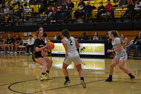 Justin Fitzgerald/sports@cherokeescout.com Murphy’s Torin Rogers freezes two Hayesville defenders during the Lady Bulldogs’ 51-27 win over the Lady Jackets on Friday.