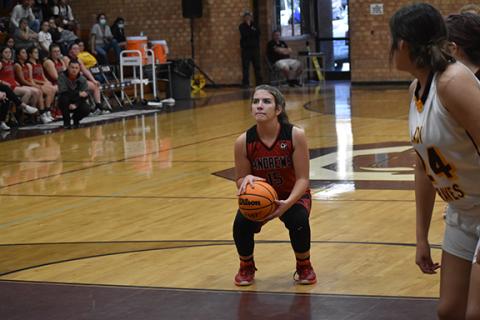  Justin Fitzgerald/sports@cherokeescout.com Andrews sophomore Kinleigh Queen eyes the basket during a free throw attempt during the Lady Wildcats’ 77-28 loss to Cherokee on Saturday.
