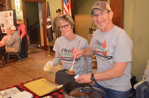 Photos by Abigail Hickman/Staff Correspondent The fourth annual Fire in the Valley Chili Cook-off was held Jan. 22 at the Valleytown Cultural Arts Center in Andrews, with food and fun for all. Curt and Leslie Steinlage show off his prized chili and her sidekick cornbread.