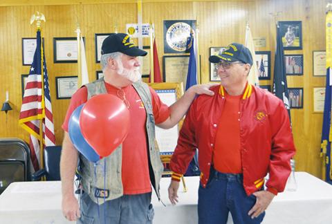 Abigail Hickman/Staff Correspondent George Bendzen and Robert Lewis celebrate the 23rd anniversary of the U.S. Marine Corps League on Saturday.