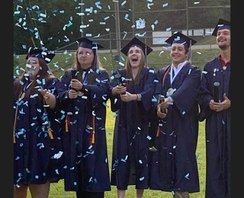 Abigail Hickman/Staff Correspondent All six graduates from Nantahala High School celebrate their success in 2021.