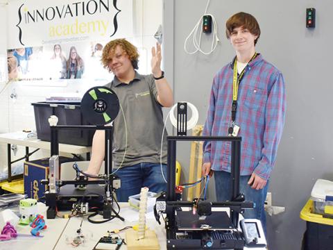 Adam Kurti and Levi Henry display various items they’ve made with 3D printers during The Learning Center charter school’s seventh annual Maker Faire on Thursday.