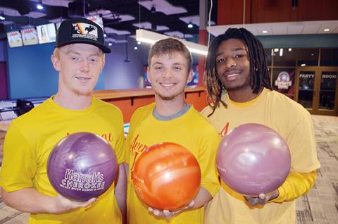 Abigail Hickman/Staff Correspondent Payton McCracken, Kellen Rumfelt and J’uan Allen (from left) of the Average Joes team get ready to strike out Saturday morning at the Multi-Tainment Center.