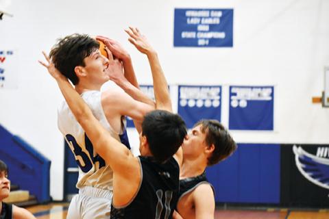 Justin Fitzgerald/sports@cherokeescout.com Hiwassee Dam’s Sam Bradford goes up for a shot during the Eagles’ 63-51 loss to Robbinsville on Feb. 9. The two teams met again at Hiwassee Dam on Feb. 22 in the first round of the playoffs, with Robbinsville winning 61-53.