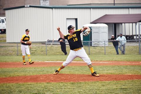 Justin Fitzgerald/sports@cherokeescout.com Murphy pitcher Briggs Cornwell strides toward the plate during the Bulldogs’ 15-2 win over Robbinsville on March 22.