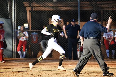Justin Fitzgerald/sports@cherokeescout.com Murphy’s Julia Dockery runs from first to second as the umpire signals a home run during the Lady Bulldogs’ 5-0 win over Franklin on March 10. Her father, Bill Dockery, is her head coach, while her sister Julia, who also hit a home run in the game, plays on the team as well.