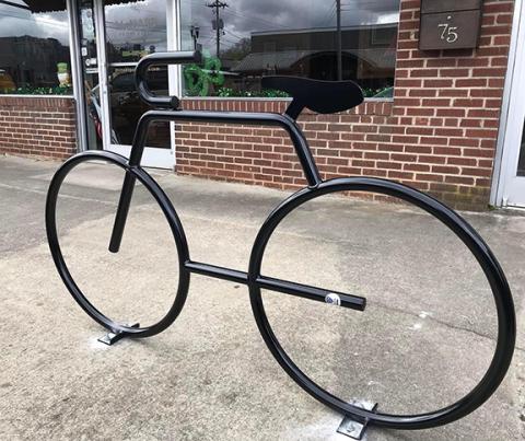 Local residents are the beneficiaries of new bicycle racks, thanks to an anonymous donor. This one is in front of McNabb Properties on Tennessee Street. Now you have one less reason not to ride on two wheels into downtown Murphy.