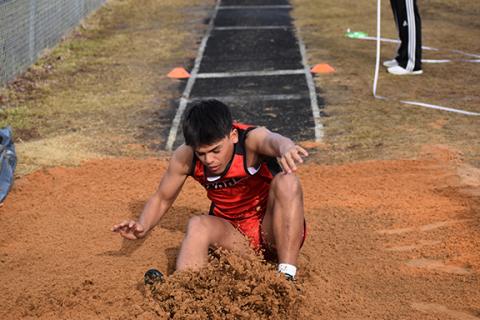 Photos by Justin Fitzgerald/sports@cherokeescout.com Andrews freshman Kegan Ellis’ landing during the long jump doesn’t go as planned during the Wildcats’ track and field meet on March 9.