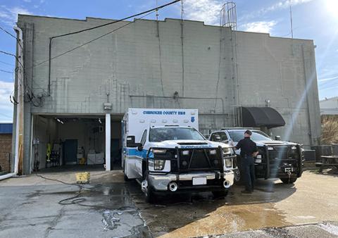 Jared Putnam/editor@cherokeescout.com Paramedic Paul Wilson washes an ambulance outside of EMS Station 1 on Tuesday morning in downtown Murphy.