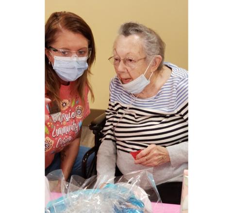 Emily Fulford/Contributing Photographer Activities director Amy Jones and resident Dorothy Graczyk enjoy the Spring Fling activities Friday afternoon.