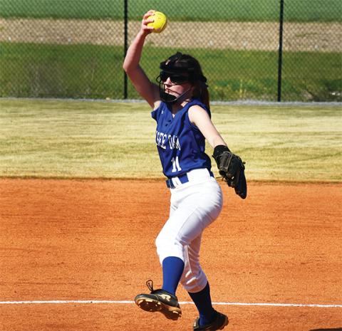 Photos by Justin Fitzgerald/sports@cherokeescout.com Hiwassee Dam’s Lauren Brooks steps to the pitching rubber during the Lady Eagles’ 5-2 loss to Hayesville on Friday.