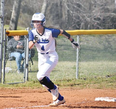 April McNabb/Contributing Photographer Hiwassee Dam’s Rylie Payne heads for home during the Lady Eagles’ 16-10 win over Cherokee on March 31.