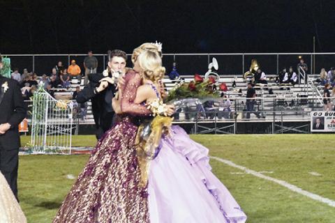 Photos by Justin Fitzgerald/sports@cherokeescout.com Torin (left) and Lochlan Rogers (right) embrace after Torin was named Murphy High School’s homecoming queen during halftime of the Bulldogs’ football game against Hayesville on Oct. 8.