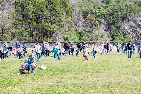 Photos by Sam Jokich/Staff Correspondent Hiwassee Dam was alive with excitement Sunday afternoon, when hundreds of kids big and small met at the fire department for food and fun before moving over to the baseball field for the annual hunt of more than 2,000 Easter eggs filled with prizes. Many kids had their routines down pat. Volunteers handed out hot dogs, ice cream, cotton candy, popcorn and drinks for the happy crowd. The strong sense of community was great to see under a beautiful spring sky along N.C.