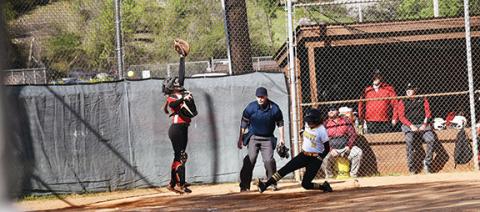 Justin Fitzgerald/sports@cherokeescout.com Murphy’s Ruby Boehm slides into home during the Lady Bulldogs’ 11-1 win over Andrews on April. 19.