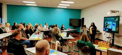 Abigail Hickman/Staff Correspondent Eugenia Floyd (right) captivates beginning teachers at their “Spring Forward 2022 NC New Teachers Support Program Professional Development Day” on March 26.