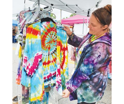 Bill Belian/Contributing Photographer  One couldn’t miss the colorful clothing on display by Vanessa Miller with Twizted Dyes.