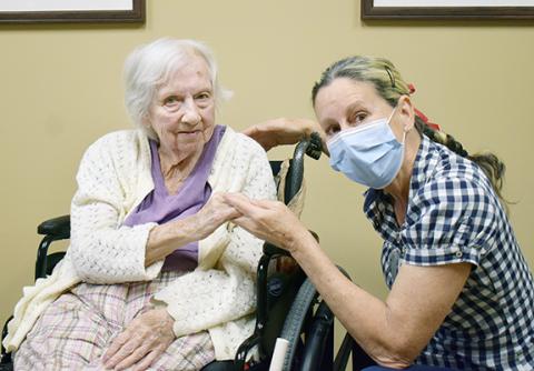 Bill Belian/Contributing Photographer  Ellie Deeb and Scout correspondent Anngee Quinones-Belian sit and chat for a spell at Murphy Rehab & Nursing.