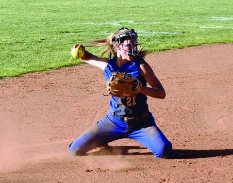 Justin Fitzgerald/sports@cherokeescout.com Hiwassee Dam’s Kiera Taylor gets dirty to make a play during the Lady Eagles’ 11-1 loss to Robbinsville on Thursday afternoon.