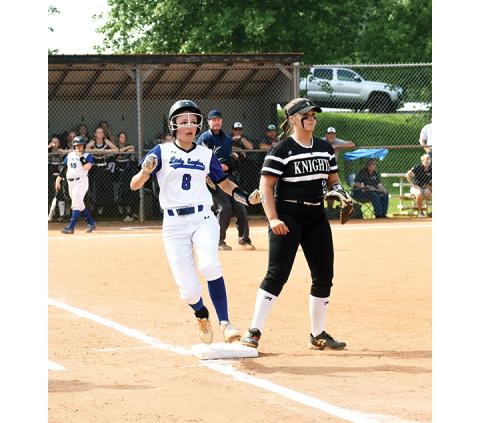 Justin Fitzgerald/sports@cherokeescout.co Hiwassee Dam’s Payton Palmer hustles to first after getting a hit in the Lady Eagles’ 7-1 loss to Robbinsville on May 2.