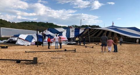The Gospel Tent, owned by Voice of Hope Ministries and located at the foot of Harrah’s Cherokee Valley River Casino & Hotel, was ripped apart Friday as tornadic-like winds whipped through Cherokee County. It was to be the last night of a two-week spiritual awakening hosted by evangelist D.R. Harrison. In the meantime, the awakening is continues at 7 p.m. nightly through Friday in the sanctuary of Murphy First Baptist Church.