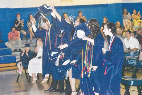 Photos by Justin Fitzgerald/sports@cherokeescout.com Nantahala High School’s Class of 2022 celebrates after receiving their diplomas Friday.