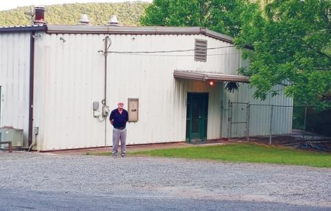 Steve Wilson, president of the Martins Creek Community Center, stands in front of the building he’s working to keep open.