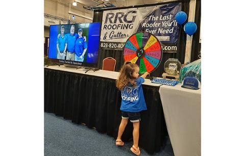 RRG Roofing & Gutters had help promoting their product from little Camille Stewart during the Home & Garden Show over the weekend.